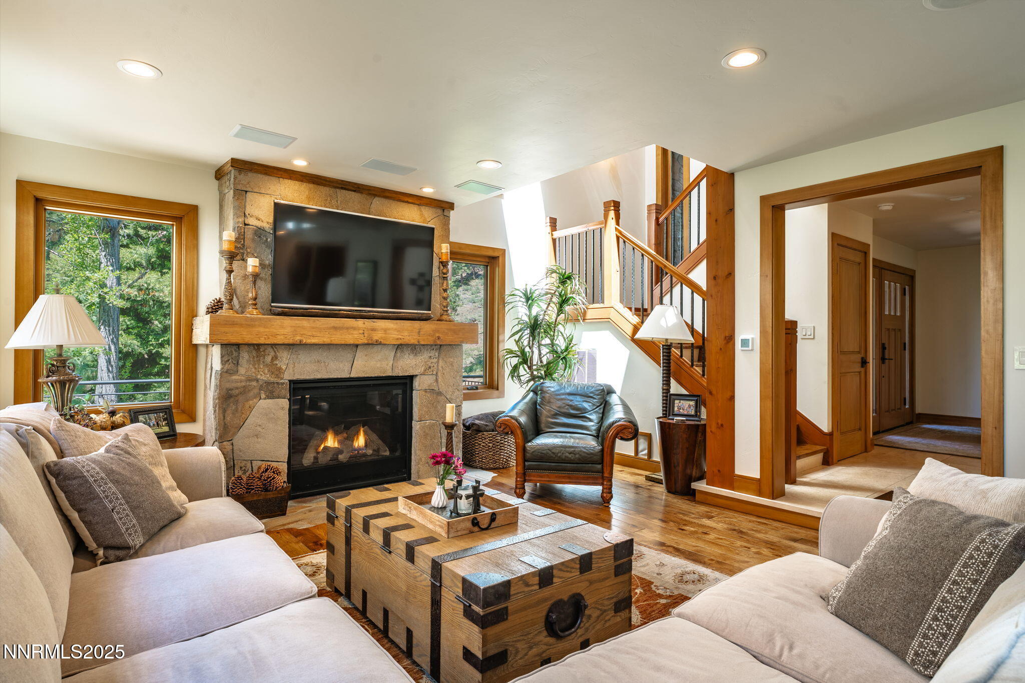 5 Kelly Circle Glenbrook, NV 89413 - Photo 6 of 38 a living room with furniture fireplace and flat screen tv