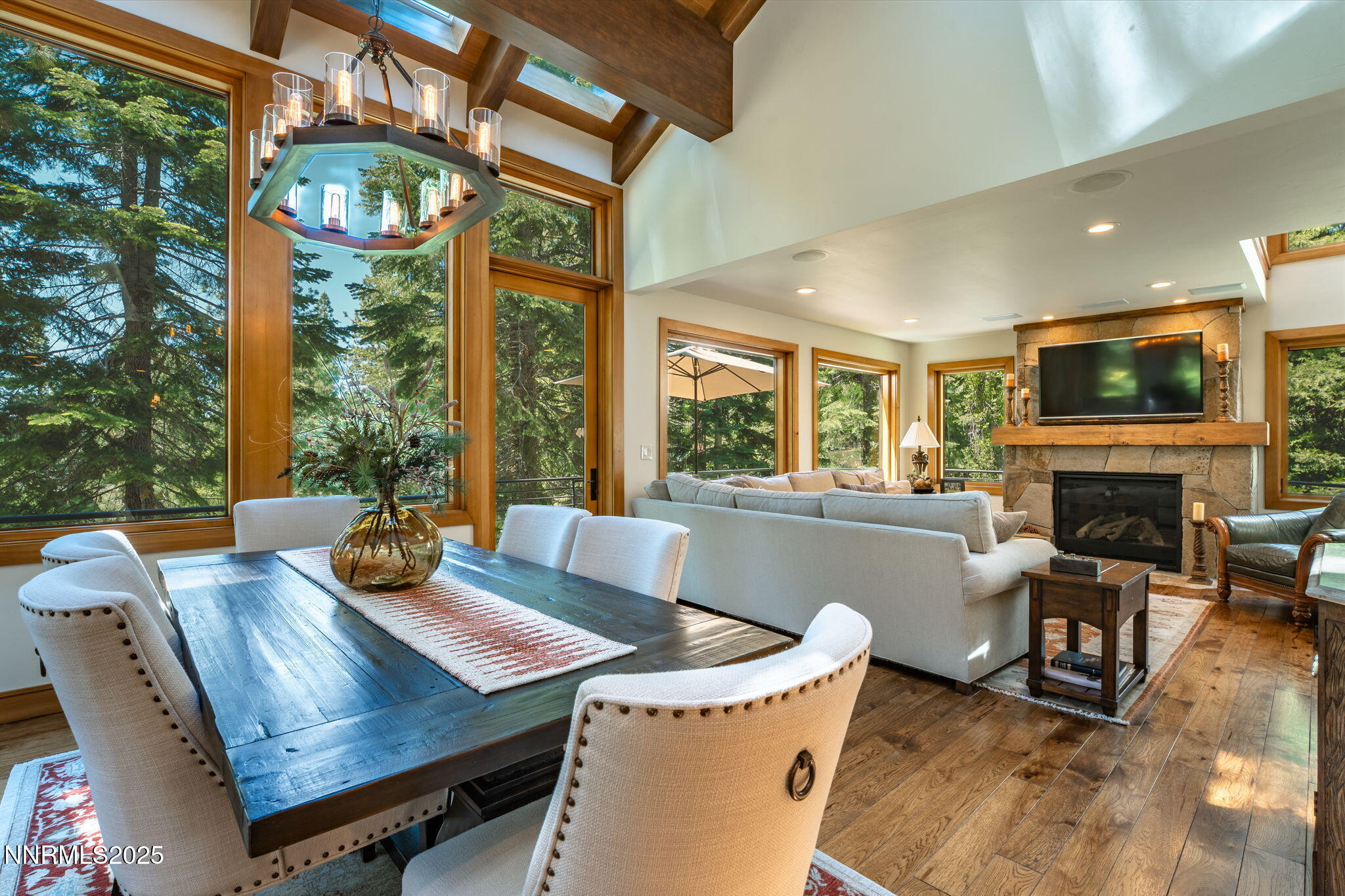5 Kelly Circle Glenbrook, NV 89413 - Photo 9 of 38 a view of a dining room with furniture a chandelier and wooden floor