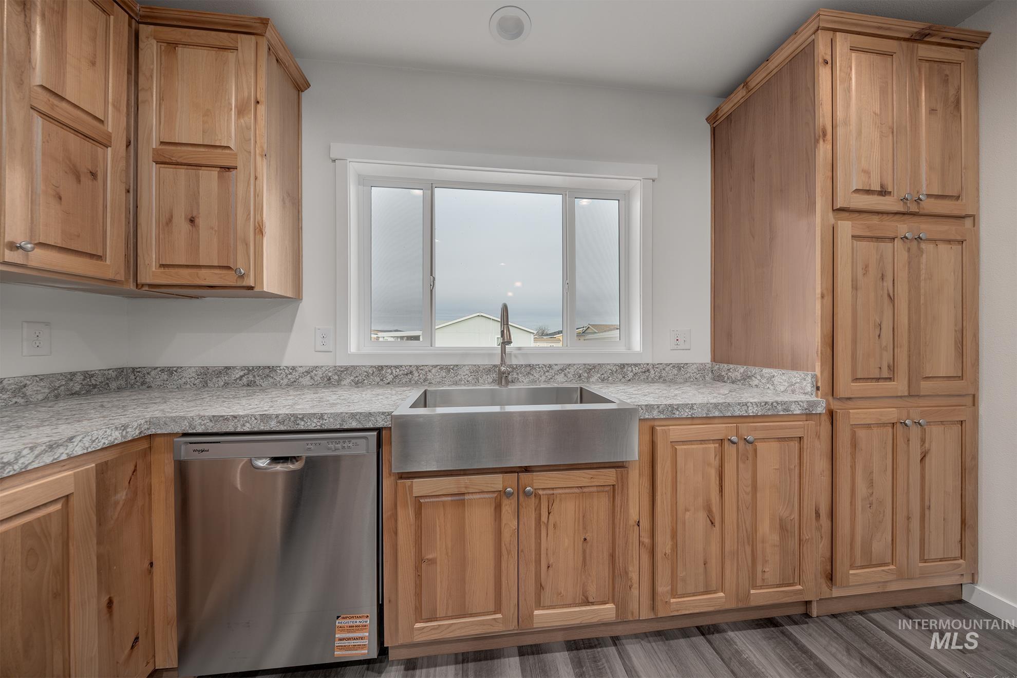 2750 Alden Road, Unit 8 8 Fruitland, ID 83619 - Photo 7 of 31 Kitchen featuring stainless steel dishwasher and a sink