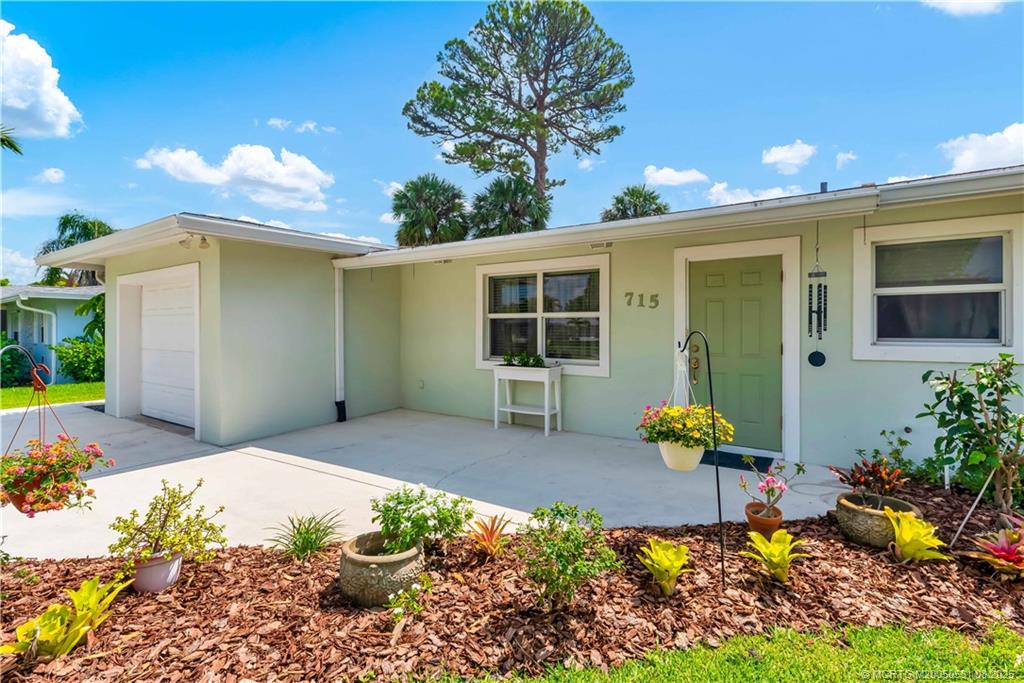 715 Southeast Alamanda Way Stuart, FL 34996 - Photo 2 of 30 Gorgeous landscaping!