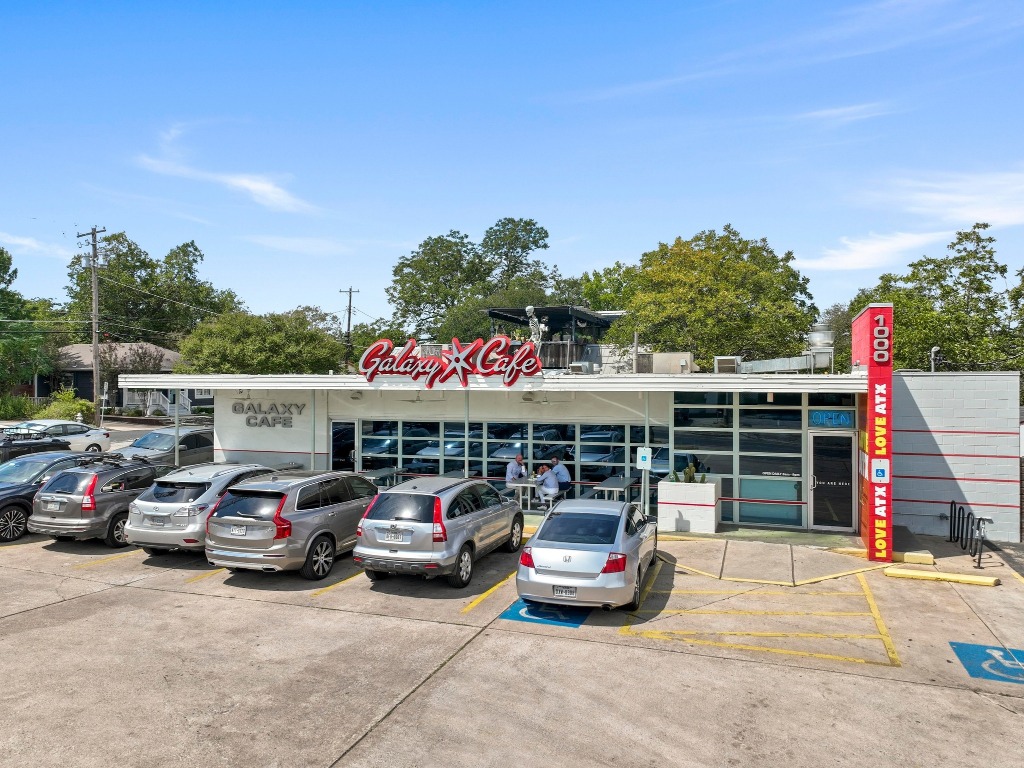 1605 West 11th Street Austin, TX 78703 - Photo 6 of 16 a car parked in front of a house