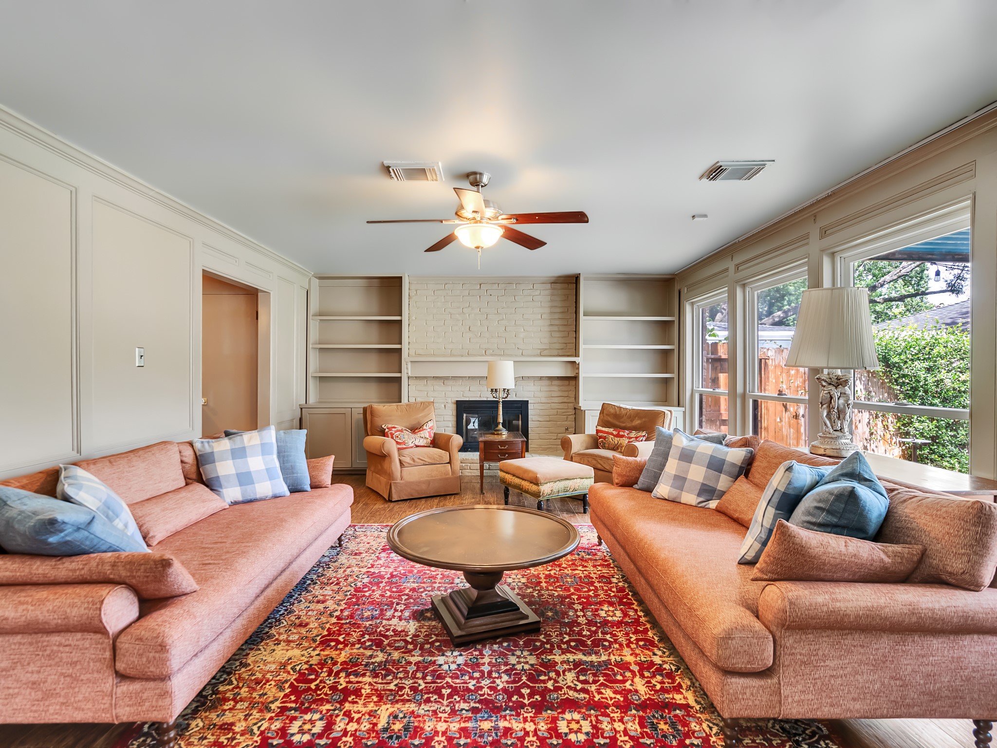 3819 Shipman Lane Spring, TX 77388 - Photo 13 of 36 Spacious living room featuring abundant natural light and a cozy fireplace.