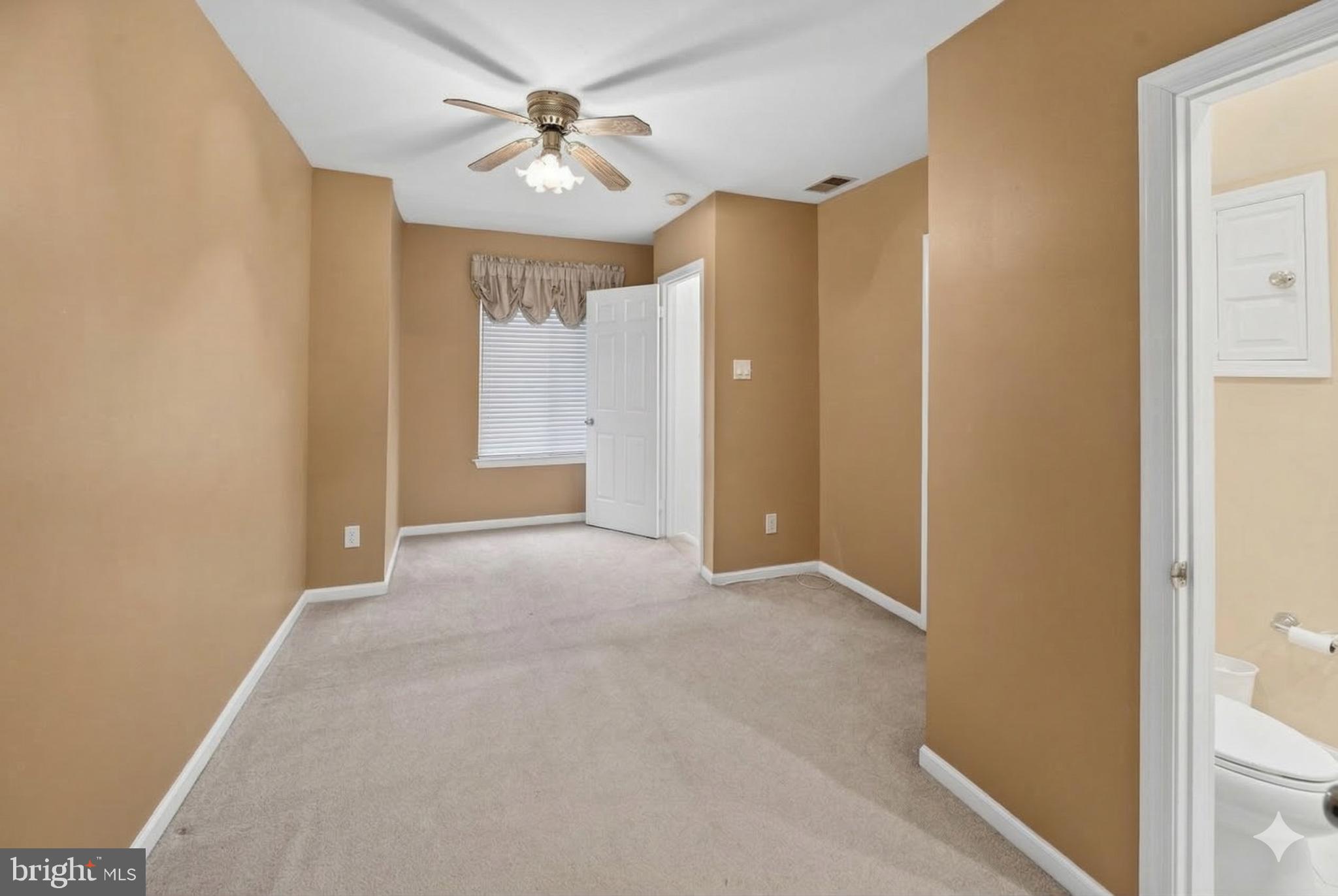 423 Cannon Court, Unit 423 Chesterbrook, PA 19087 - Photo 20 of 26 a view of a big room with windows and chandelier fan
