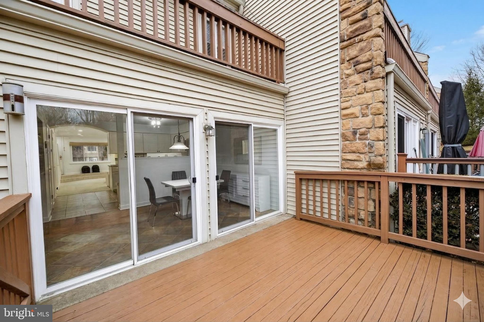 423 Cannon Court, Unit 423 Chesterbrook, PA 19087 - Photo 25 of 26 a view of a balcony with wooden floor