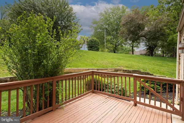 a view of balcony with wooden floor