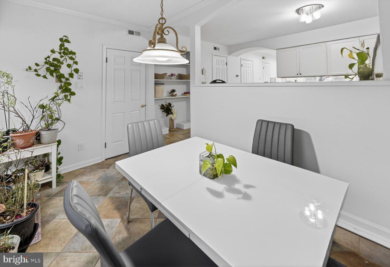 423 Cannon Court, Unit 423 Chesterbrook, PA 19087 - Photo 10 of 26 a living room with furniture and wooden floor