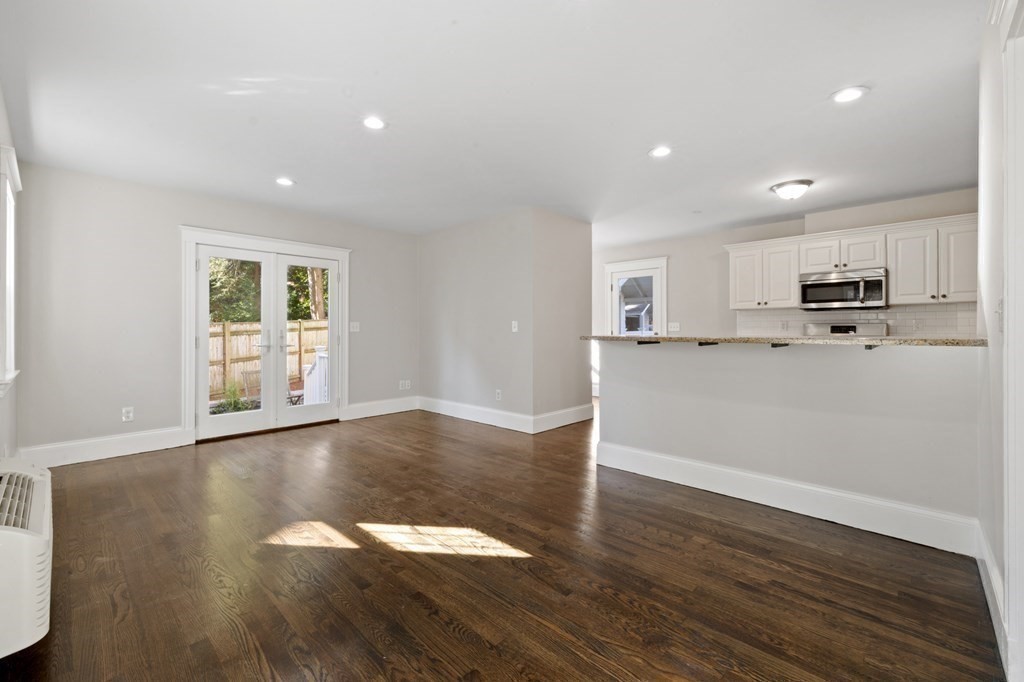 3 Dexter Road Wellesley, MA 02482 - Photo 14 of 40 a view of a kitchen with a sink and wooden floor