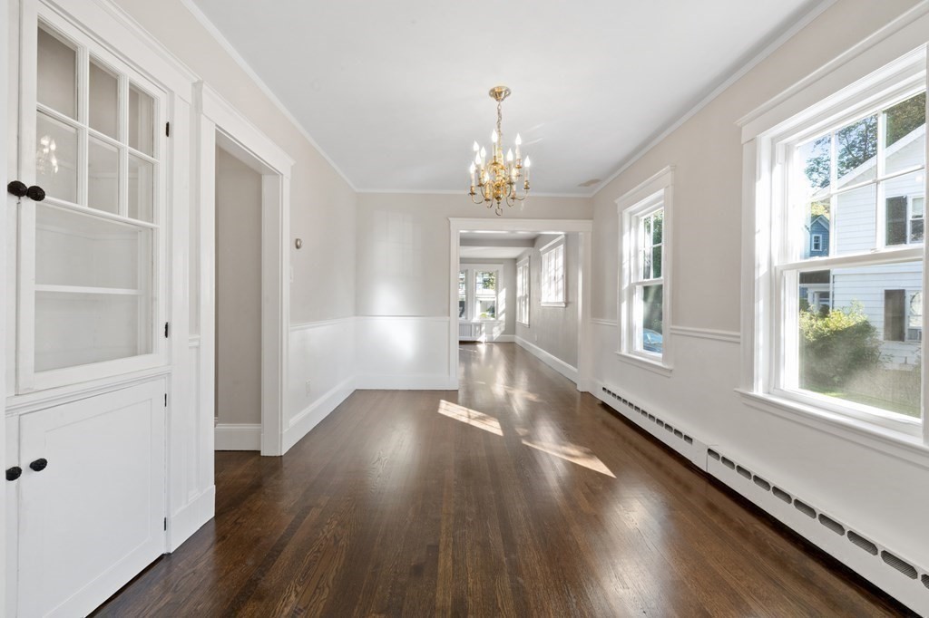 3 Dexter Road Wellesley, MA 02482 - Photo 16 of 40 a view of a room with wooden floor and windows