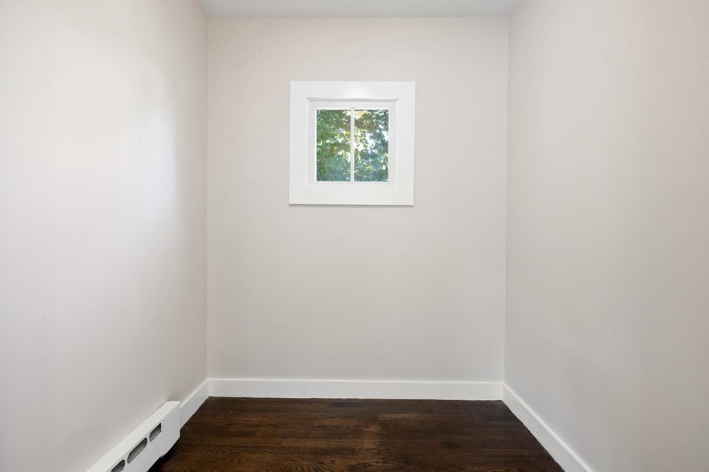 3 Dexter Road Wellesley, MA 02482 - Photo 25 of 40 a view of room with wooden floor and window