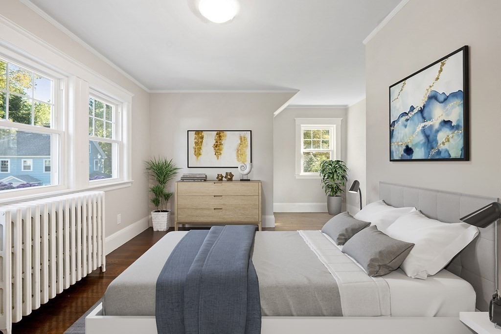 3 Dexter Road Wellesley, MA 02482 - Photo 29 of 40 a bedroom with a large bed and a window