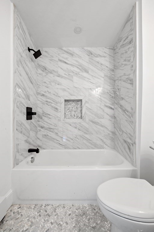 3 Dexter Road Wellesley, MA 02482 - Photo 34 of 40 a bathroom with a toilet and a bathtub