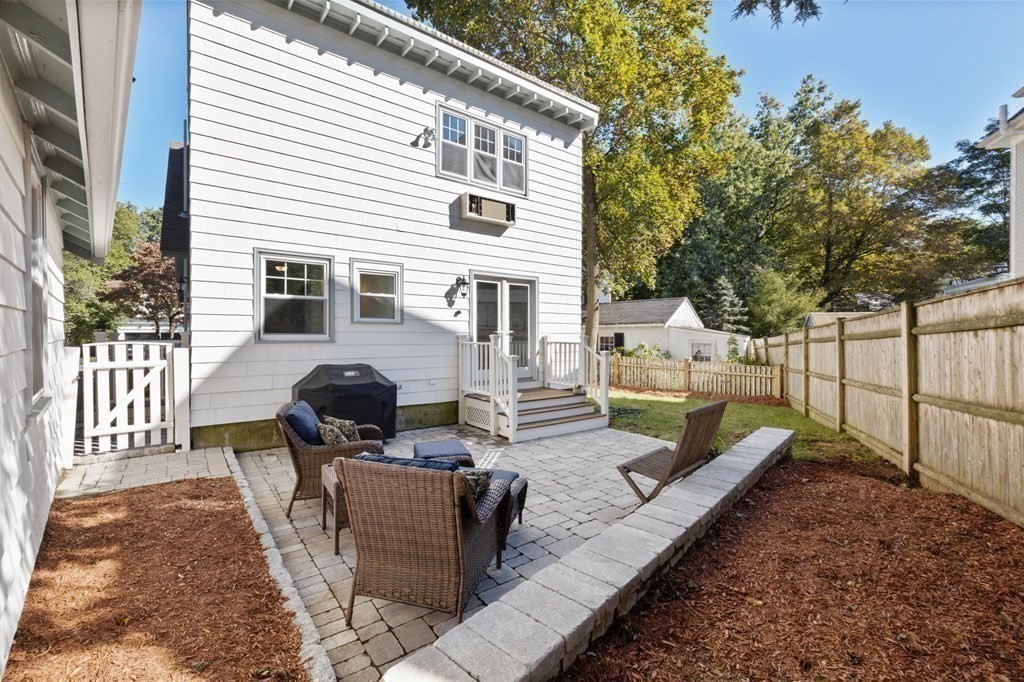 3 Dexter Road Wellesley, MA 02482 - Photo 36 of 40 a view of a house with backyard and sitting area