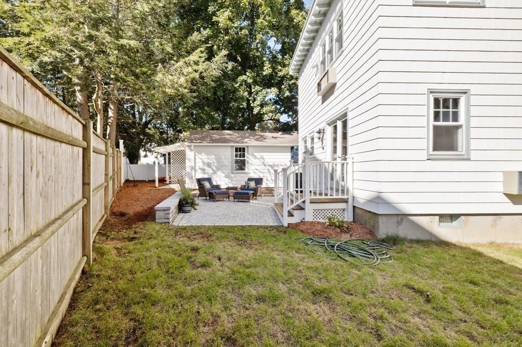 3 Dexter Road Wellesley, MA 02482 - Photo 38 of 40 a view of a house with a yard and sitting area