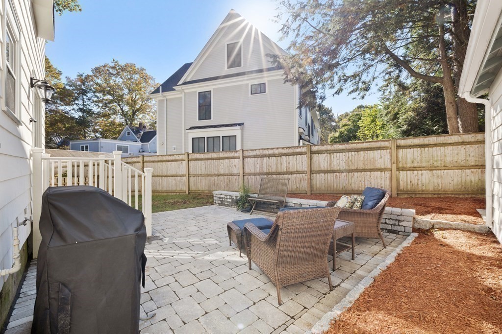 3 Dexter Road Wellesley, MA 02482 - Photo 39 of 40 a view of a patio with iron fence