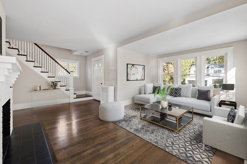 3 Dexter Road Wellesley, MA 02482 - Photo 8 of 40 a living room with fireplace furniture and a wooden floor