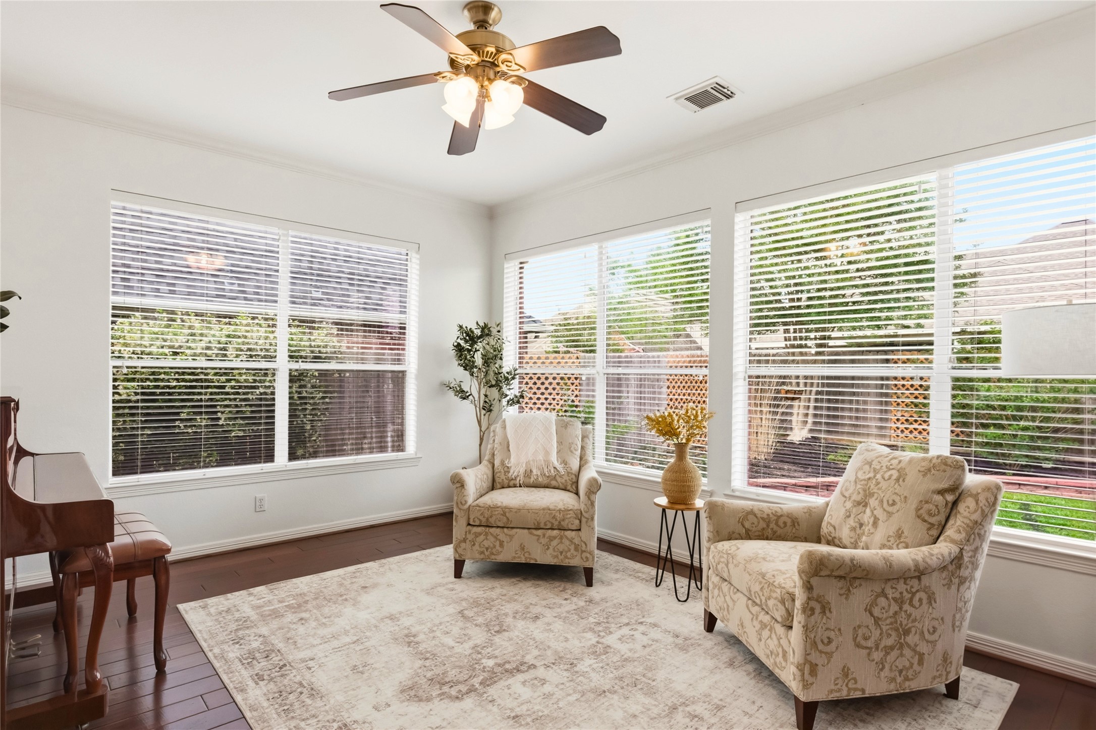 20722 Windrose Bend Drive Spring, TX 77379 - Photo 18 of 50 This peaceful sunroom offers a serene retreat with abundant natural light and cozy elegance.