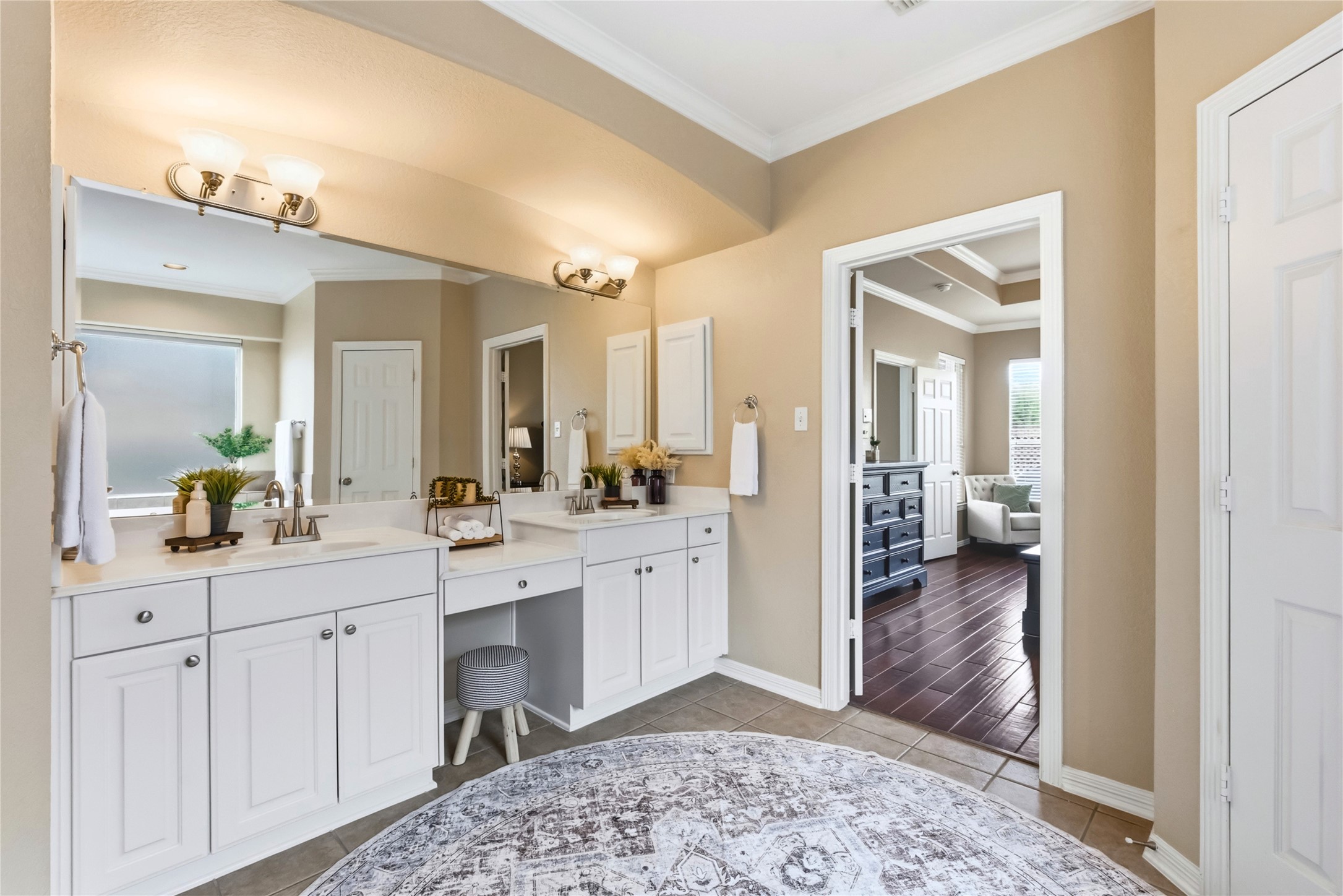 20722 Windrose Bend Drive Spring, TX 77379 - Photo 24 of 50 Experience luxury and convenience with this elegant bathroom featuring dual sinks and a stylish vanity, perfect for your daily skincare routine.