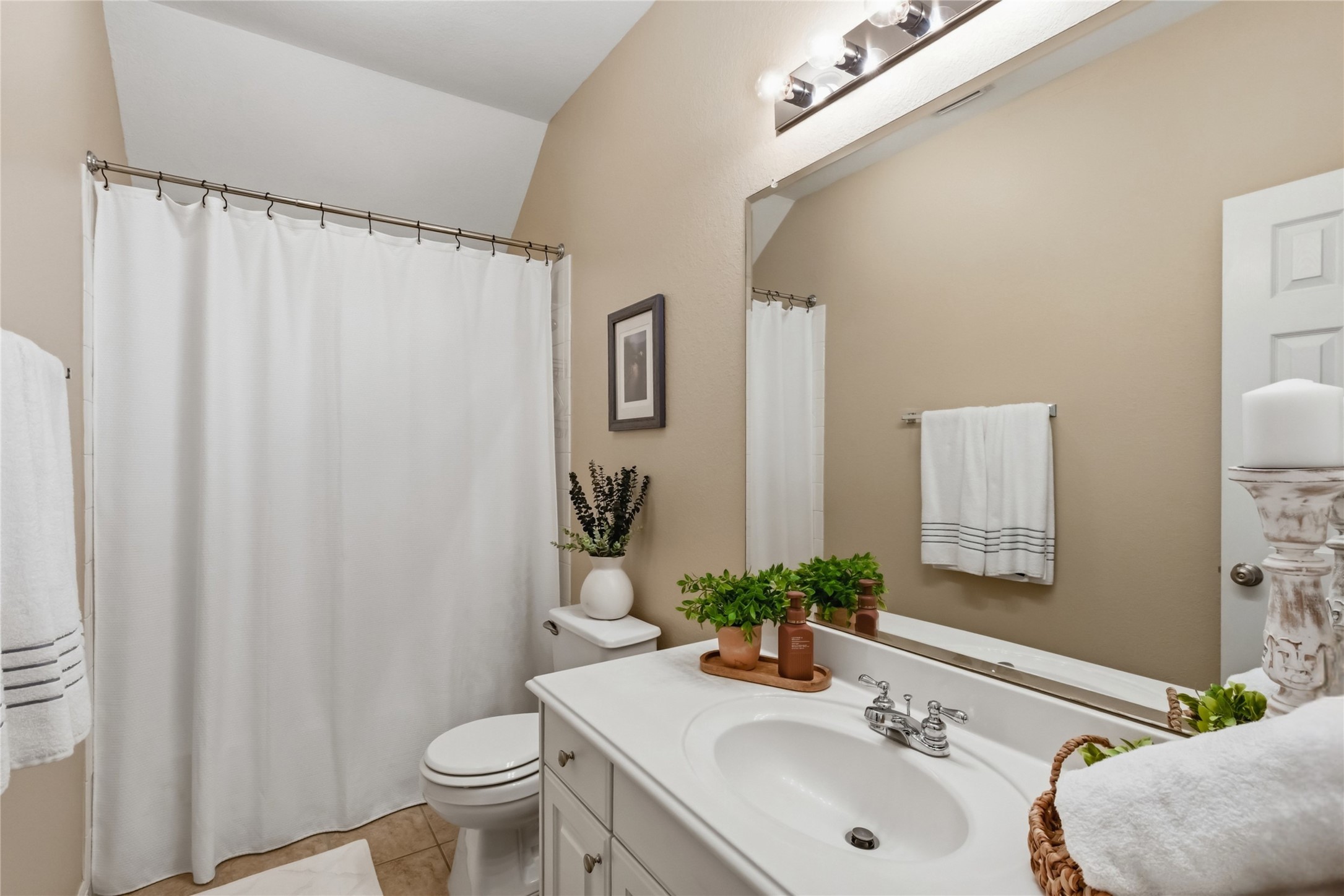 20722 Windrose Bend Drive Spring, TX 77379 - Photo 36 of 50 Upstairs you'll find the 3rd full bath is conveniently located just outside the guest bedroom, offering a perfect blend of style and accessibility for your visitors.
