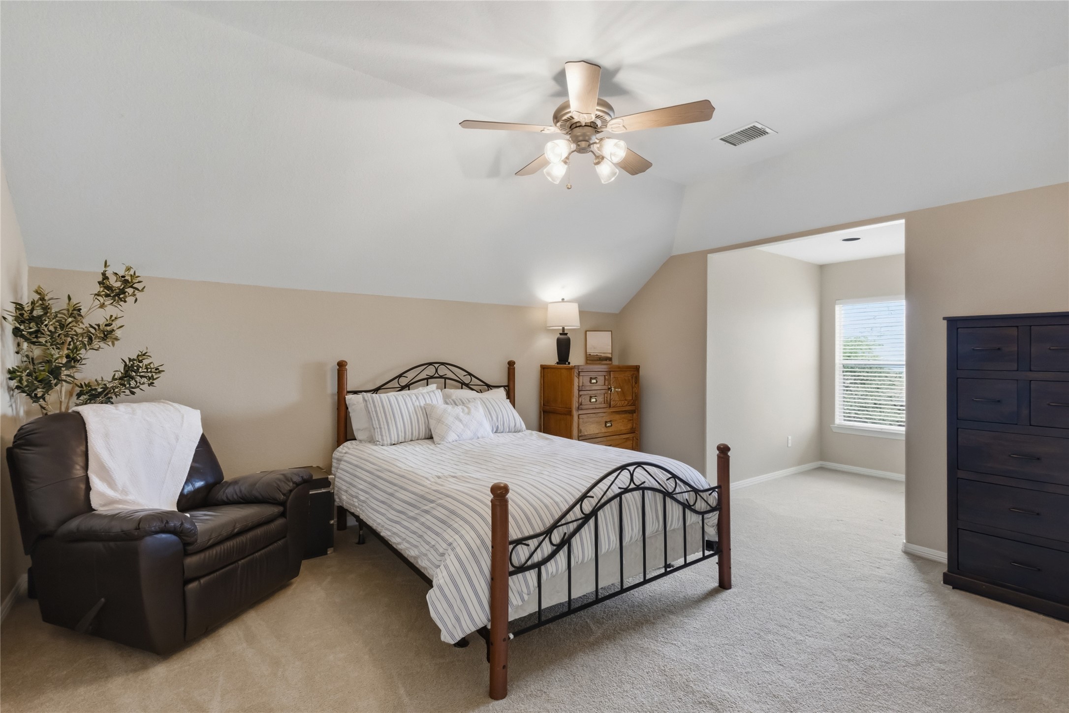 20722 Windrose Bend Drive Spring, TX 77379 - Photo 37 of 50 Take in your spacious 4th bedroom upstairs, featuring an additional bump out space with stunning backyard views, perfect for a craft or hobby area.