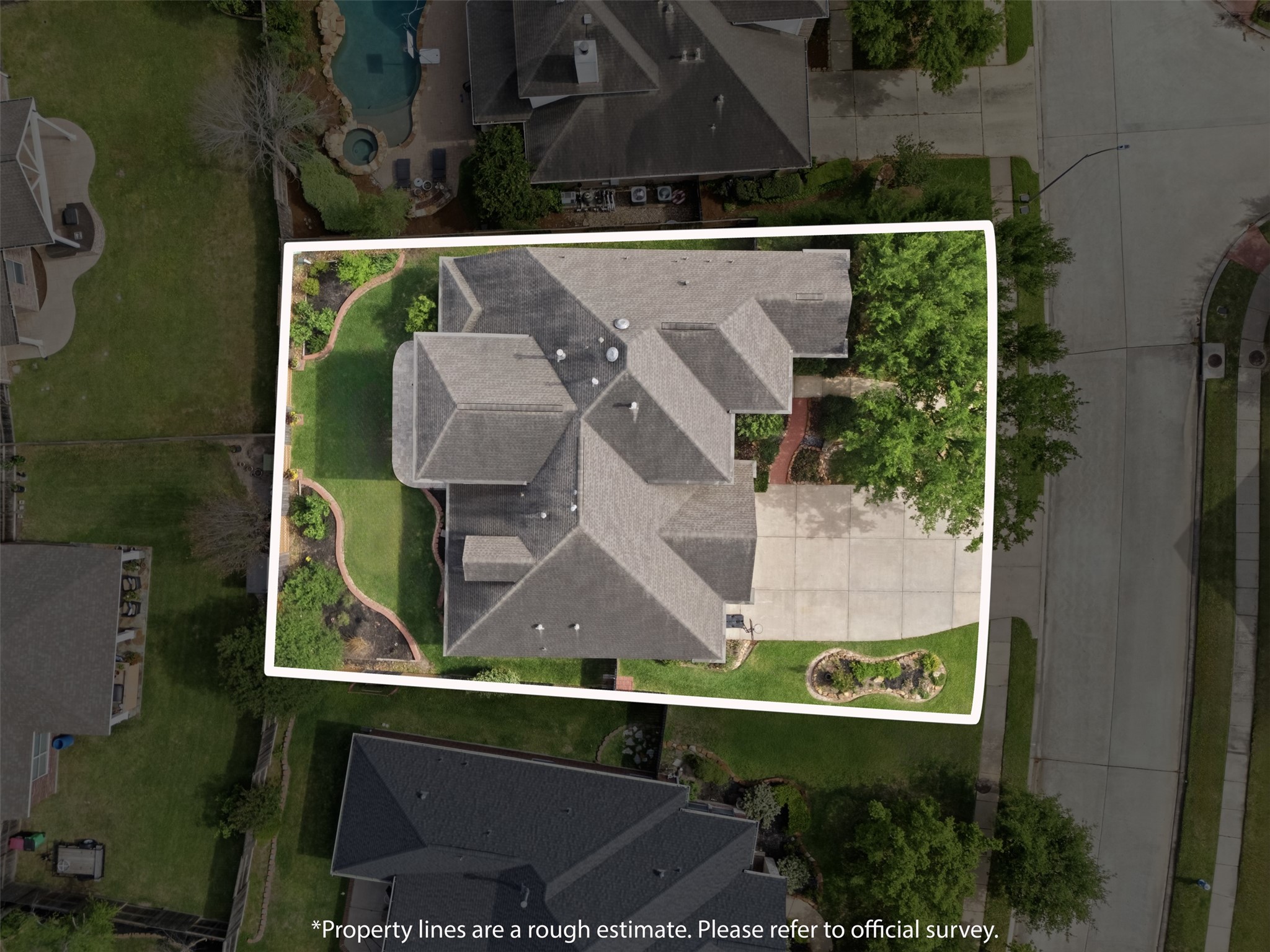 20722 Windrose Bend Drive Spring, TX 77379 - Photo 40 of 50 An aerial photo showcases this spacious property & its well-maintained yard, large driveway, and surrounding greenery.