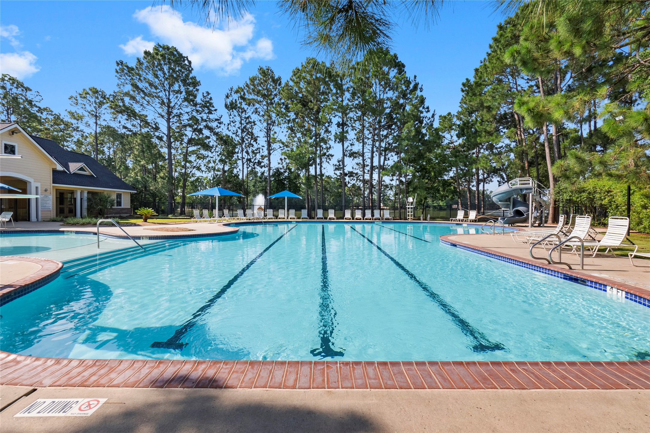 20722 Windrose Bend Drive Spring, TX 77379 - Photo 47 of 50 Relax at the other Windrose pool located right outside Eagle Lake. This one has a shallow kiddie pool area, as well as a big covered slide!