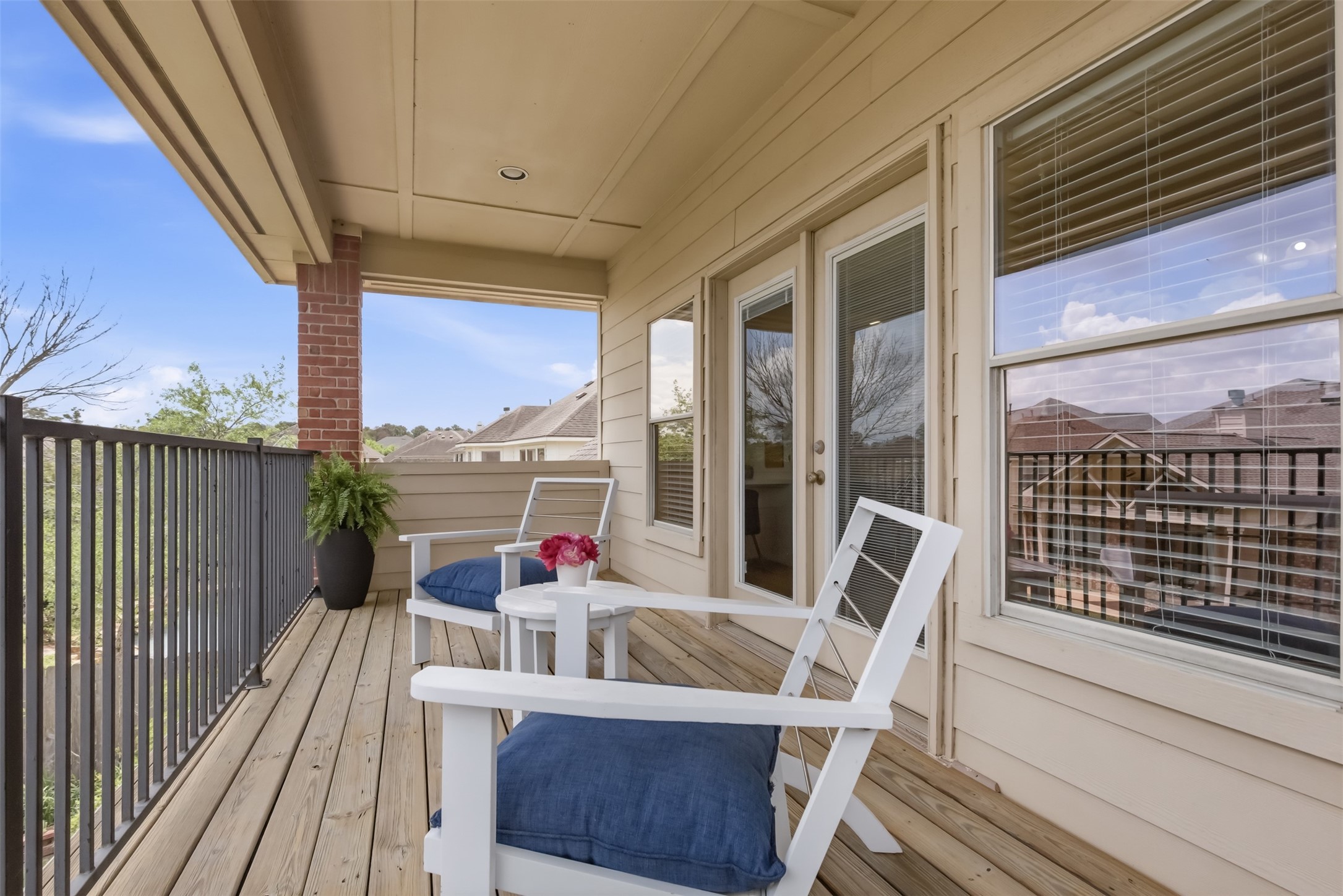 20722 Windrose Bend Drive Spring, TX 77379 - Photo 7 of 50 An inviting outdoor balcony is the perfect spot to savor your morning coffee or enjoy a refreshing outdoor workspace, blending relaxation with productivity.