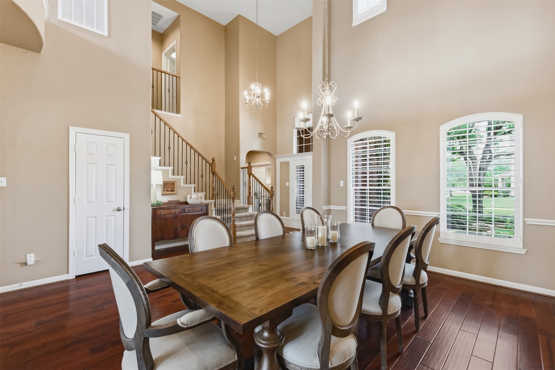 20722 Windrose Bend Drive Spring, TX 77379 - Photo 10 of 50 Experience elegance with soaring ceilings in this open and inviting formal dining area, perfect for entertaining.