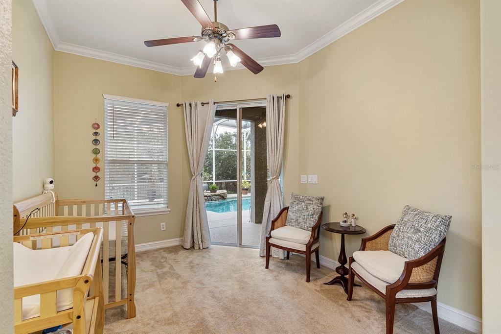 5713 Oak Lake Trail Oviedo, FL 32765 - Photo 22 of 52 a living room with furniture and a chandelier