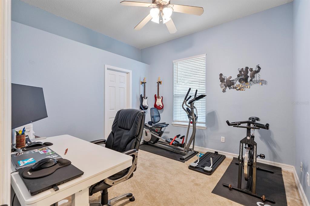 5713 Oak Lake Trail Oviedo, FL 32765 - Photo 28 of 52 a view of a room with gym equipment