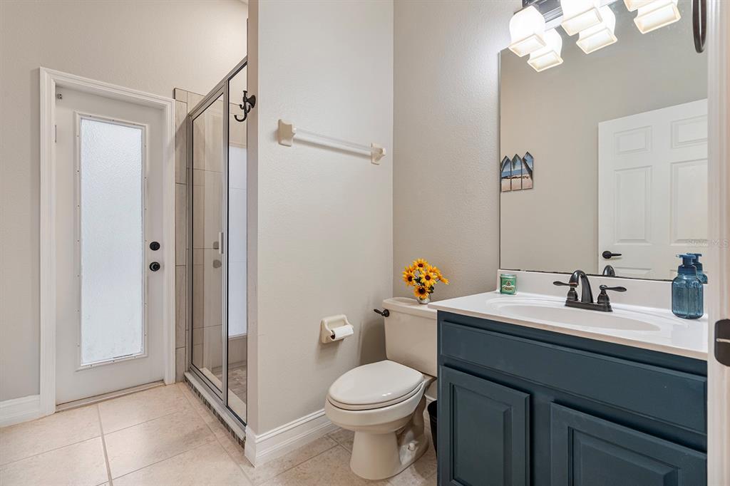 5713 Oak Lake Trail Oviedo, FL 32765 - Photo 30 of 52 a bathroom with a sink toilet and shower