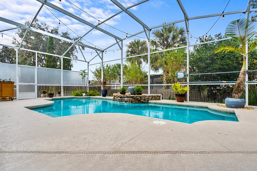 5713 Oak Lake Trail Oviedo, FL 32765 - Photo 32 of 52 a view of a backyard with swimming pool