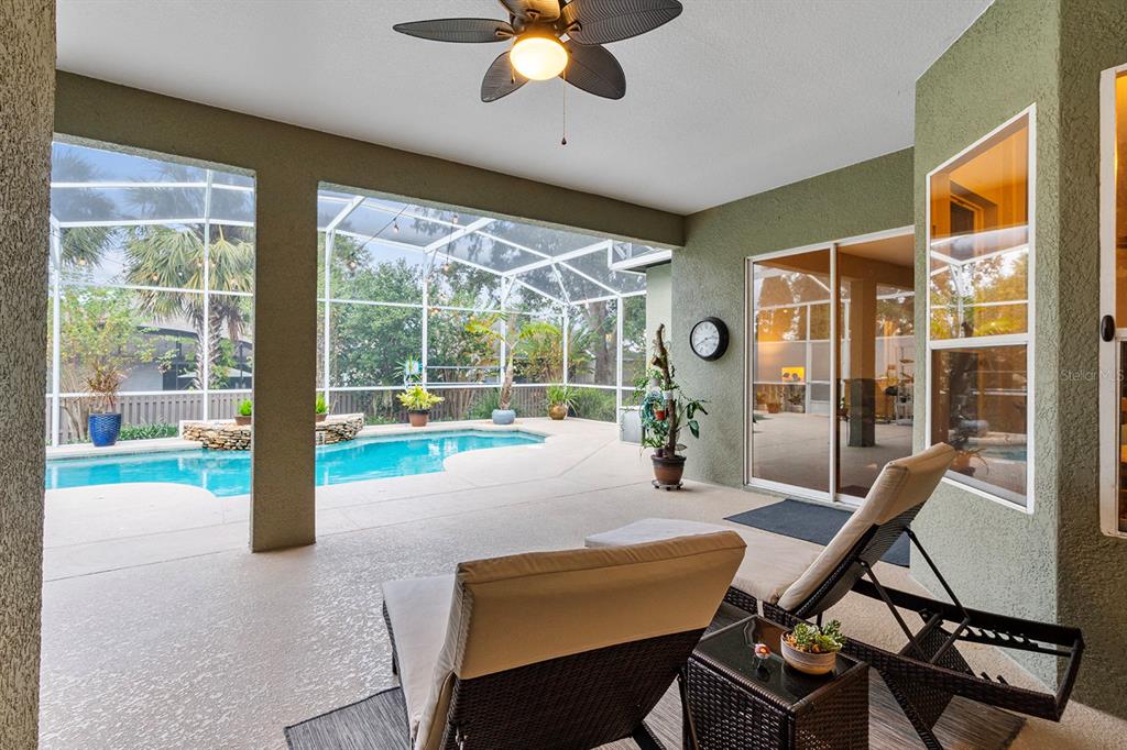 5713 Oak Lake Trail Oviedo, FL 32765 - Photo 34 of 52 a view of a dining room with furniture window and outside view