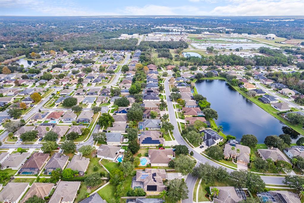5713 Oak Lake Trail Oviedo, FL 32765 - Photo 40 of 52 an aerial view of residential houses with outdoor space