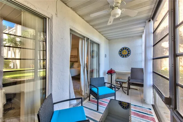 a room with furniture and a window