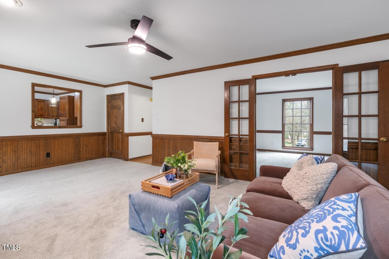 112 Ridgepath Way Cary, NC 27511 - Photo 9 of 38 a living room with furniture and a potted plant