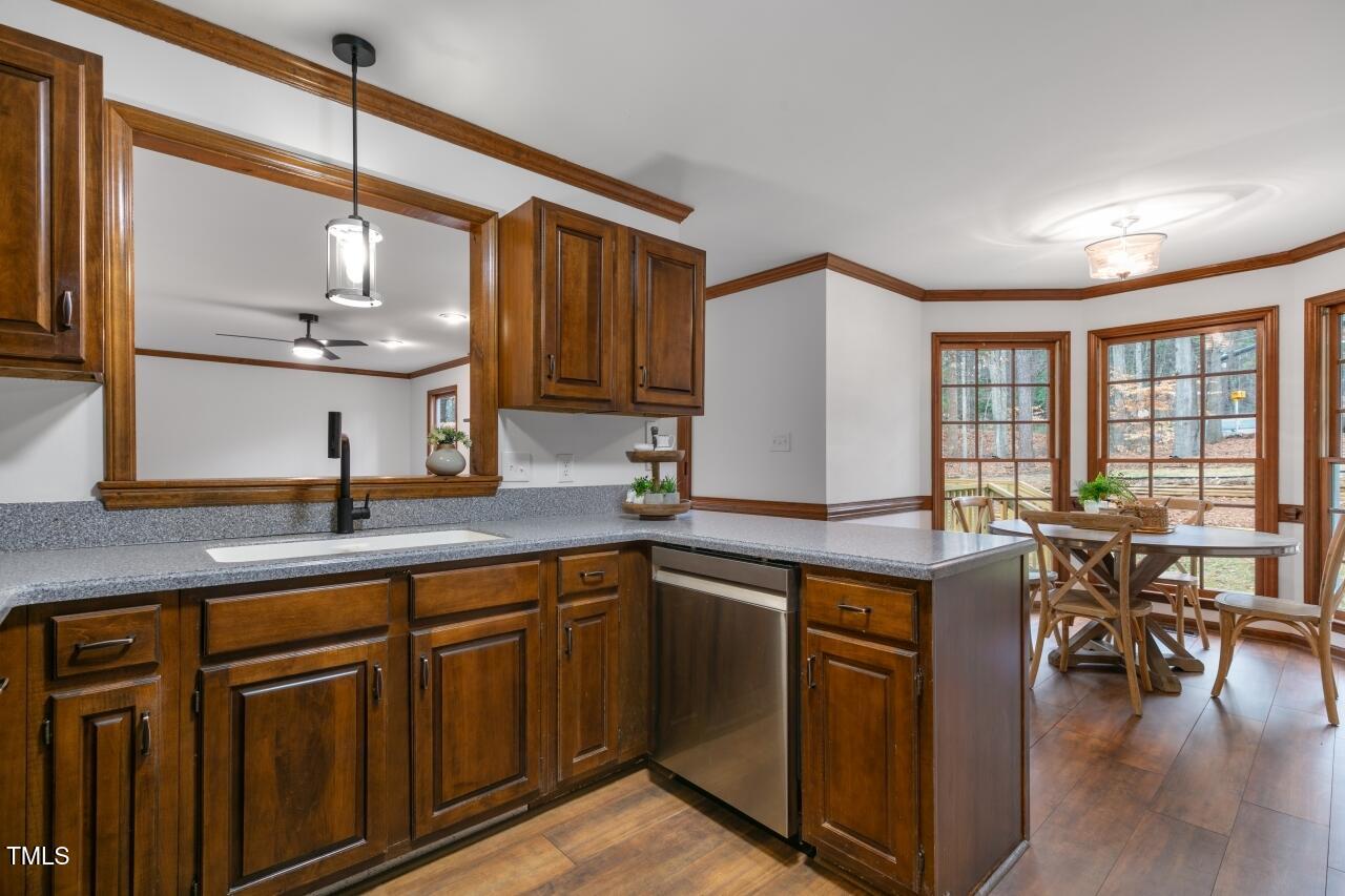 112 Ridgepath Way Cary, NC 27511 - Photo 13 of 38 a kitchen with lots of counter top space and dining table