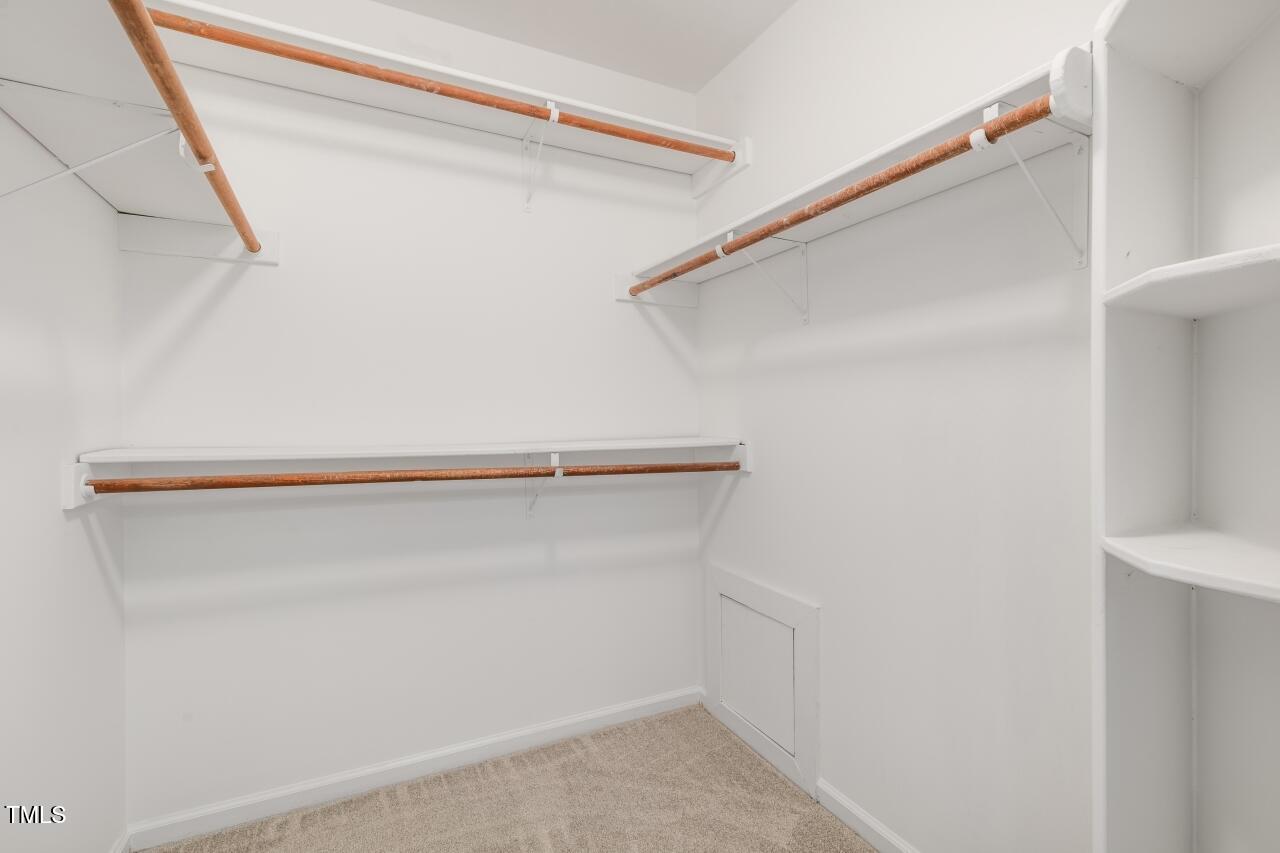 112 Ridgepath Way Cary, NC 27511 - Photo 22 of 38 a view of an empty walk in closet