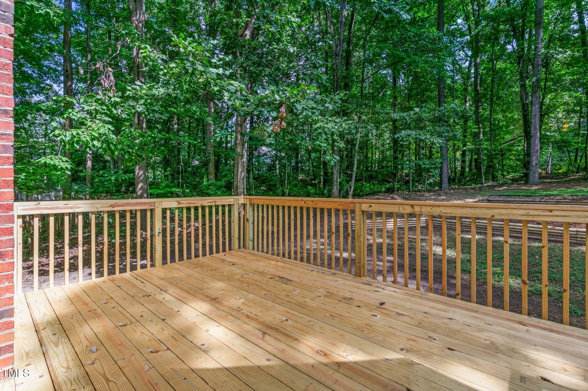 112 Ridgepath Way Cary, NC 27511 - Photo 33 of 38 a view of a wooden roof deck
