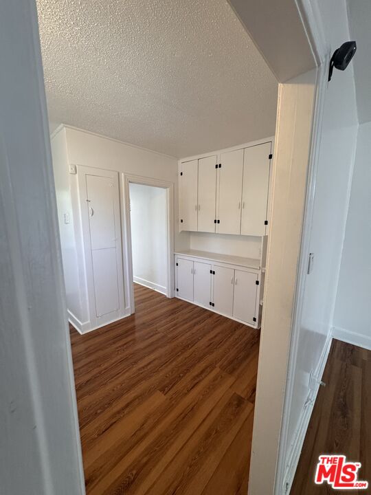 1650 South Rimpau Boulevard Los Angeles, CA 90019 - Photo 5 of 12 a view of kitchen and empty room with window