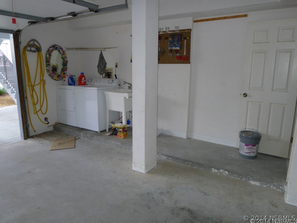 6544 Engram Road, Unit E204 New Smyrna Beach, FL 32169 - Photo 21 of 22 a view of a storage & utility room