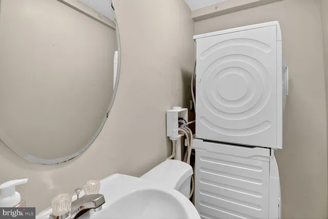 a bathroom with a toilet and a bathtub