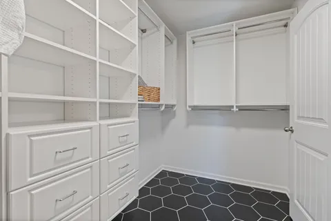 a view of an empty walk in closet