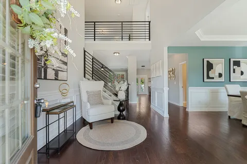 a bathroom with a sink a mirror and a toilet