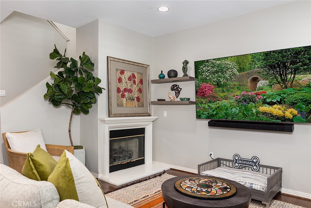 453 North Altadena Drive, Unit 7 Pasadena, CA 91107 - Photo 12 of 27 a living room with furniture and a fireplace