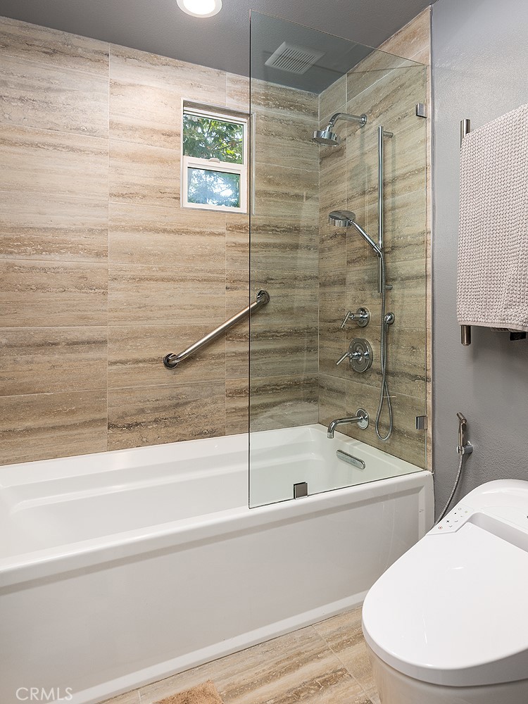453 North Altadena Drive, Unit 7 Pasadena, CA 91107 - Photo 21 of 27 a bathroom with a bathtub and a shower