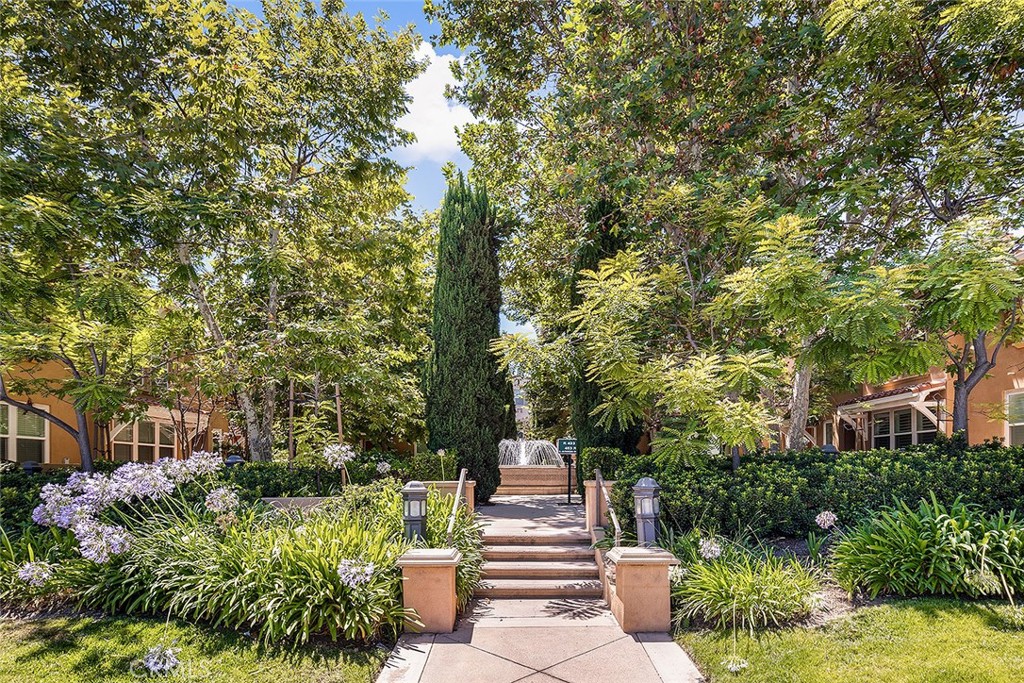 453 North Altadena Drive, Unit 7 Pasadena, CA 91107 - Photo 4 of 27 a view of a garden with plants and large trees