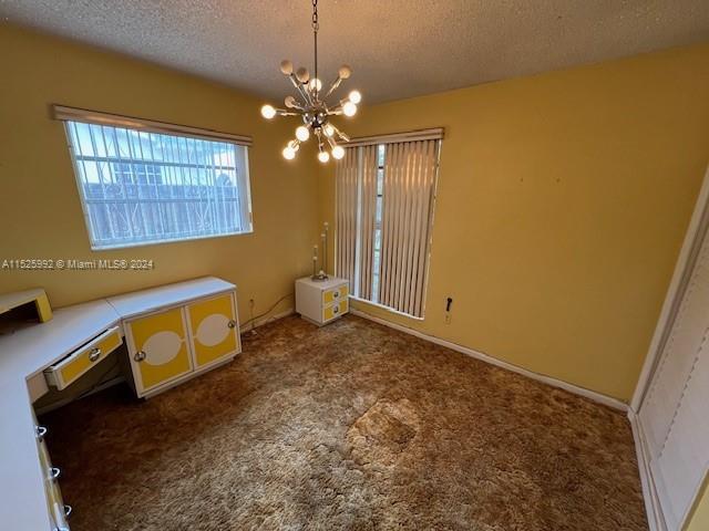 8253 West 14th Court Hialeah, FL 33014 - Photo 11 of 13 a view of an empty room with a bathroom