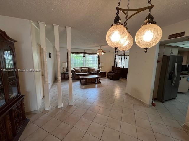 8253 West 14th Court Hialeah, FL 33014 - Photo 4 of 13 a view of a livingroom with furniture fridge and wooden floor