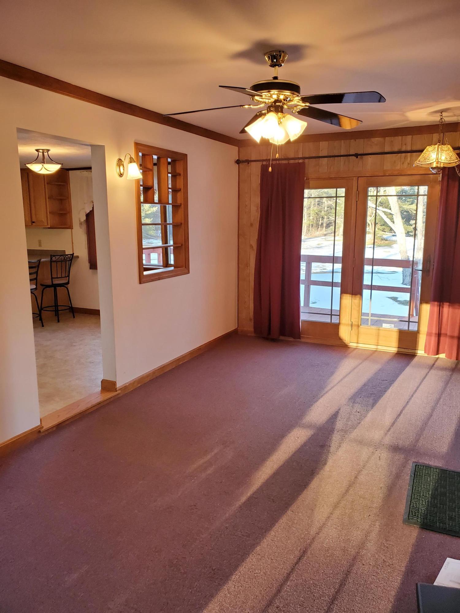 1074 China Road Winslow, ME 04901 - Photo 7 of 35 7 breezeway with deck _ entrance