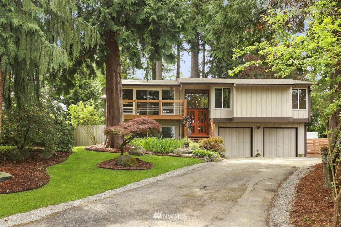 218 221st Street Southwest Bothell, WA 98021 - Photo 1 of 40 a house with a tree in front of it